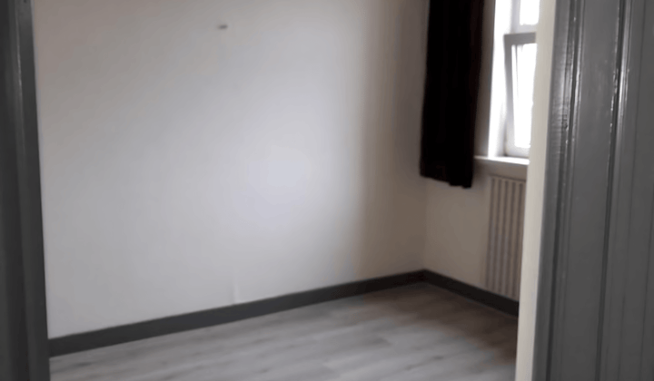 Gestoffeerde studentenkamer met tuin en wasmachine