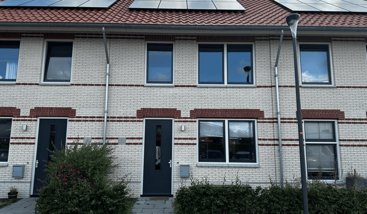 Tussenwoning met tuin en drie slaapkamers