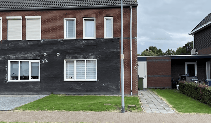 Tussenwoning met tuin en 3 slaapkamers