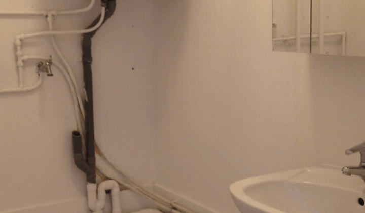 Gemeubileerd appartement met tuin en twee slaapkamers