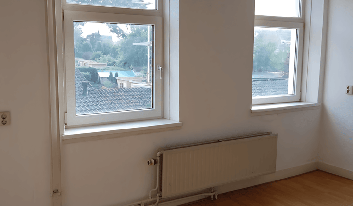 Gestoffeerde studentenkamer met tuin en wifi