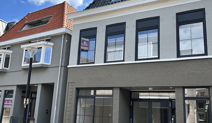 Appartement met tuin, wasmachine en parkeerplaats