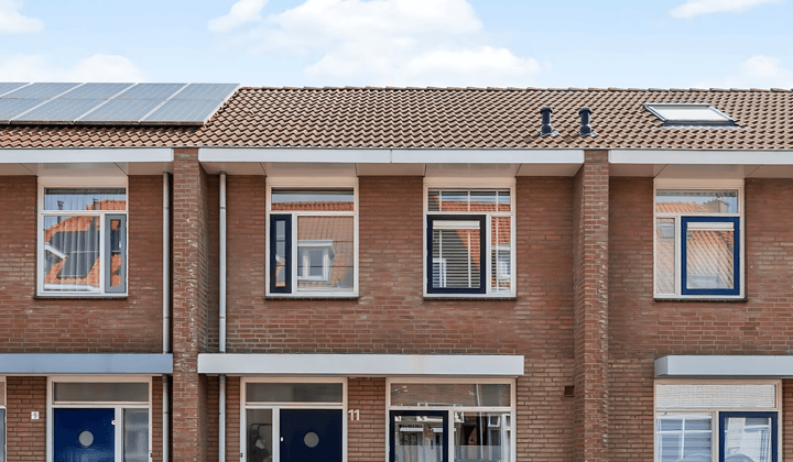 Gestoffeerde eengezinswoning met tuin en wasmachine