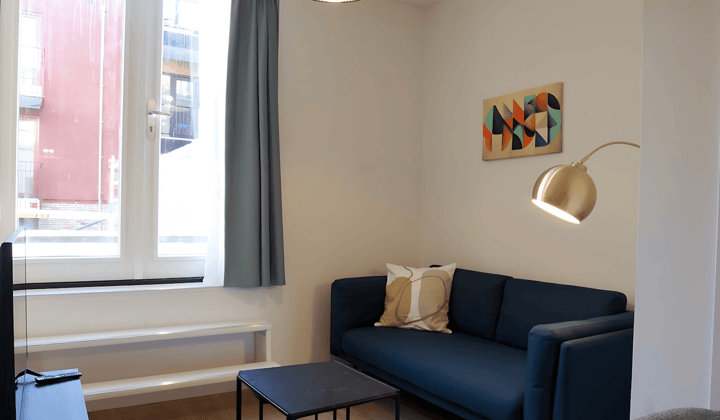 Gemeubileerd appartement met tuin en balkon