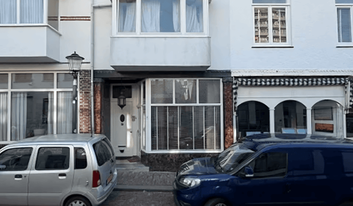 Appartement met tuin en parkeervergunning in centrum