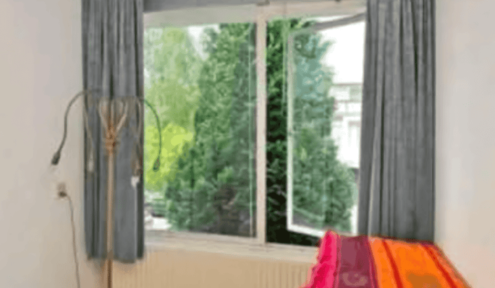 Studentenkamer met balkon en tuin