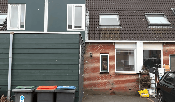 Tussenwoning met 4 slaapkamers en tuin