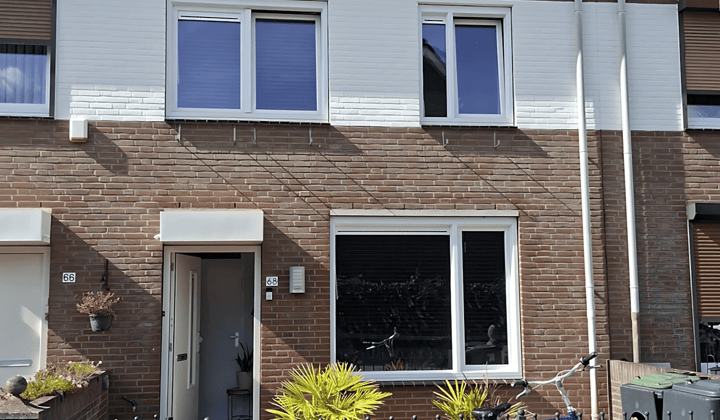 Tussenwoning met tuin en drie slaapkamers