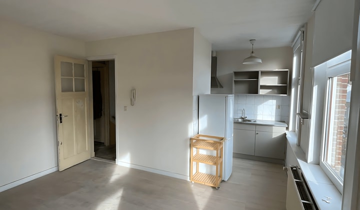 Gestoffeerde studio met slaapkamer en gedeelde badkamer