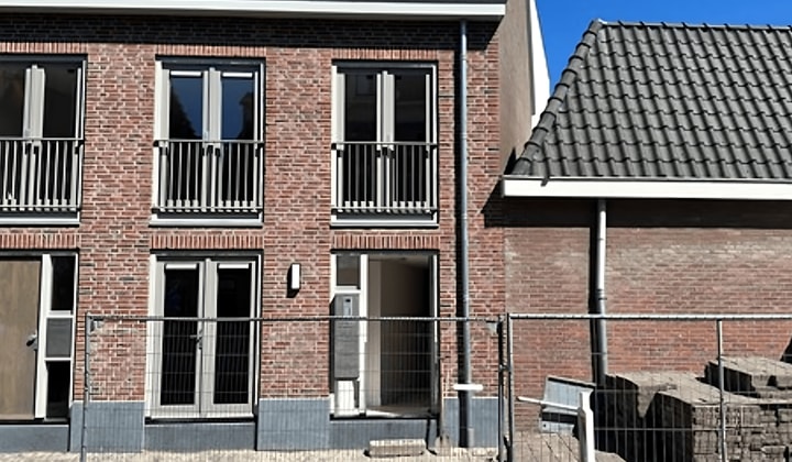 Gemeubileerd appartement met tuin in monument