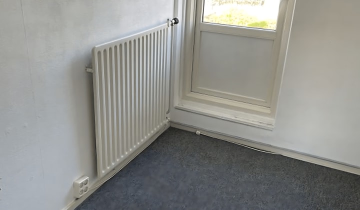 Studentenkamer met tuin en wasmachine