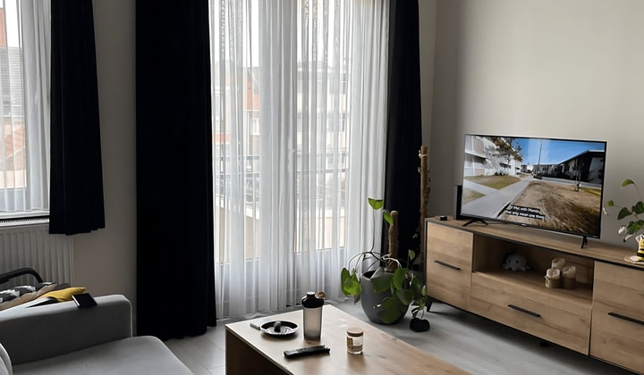Gemeubileerd appartement met balkon in monumentaal pand