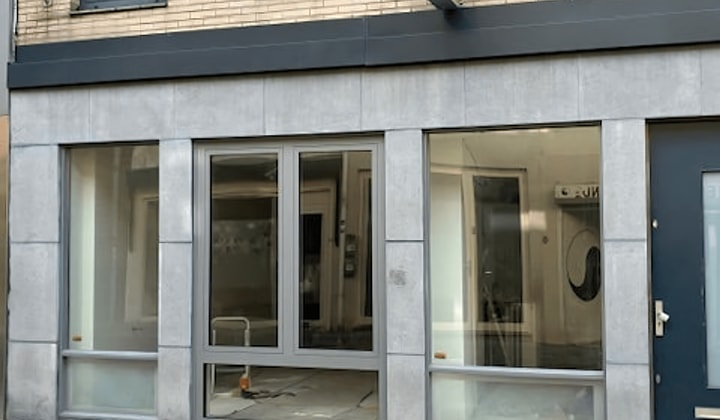 Appartement met tuin en parkeerplek