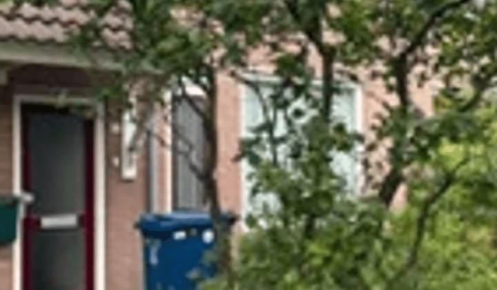 Appartement met tuin en parkeerplaats