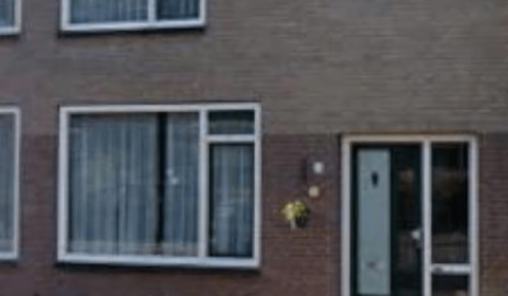 Eengezinswoning met tuin en parkeergelegenheid