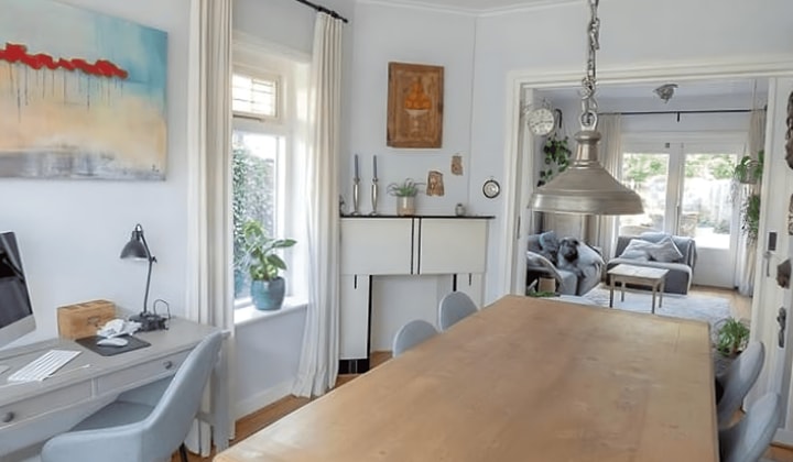 Gestoffeerde eengezinswoning met tuin en balkon