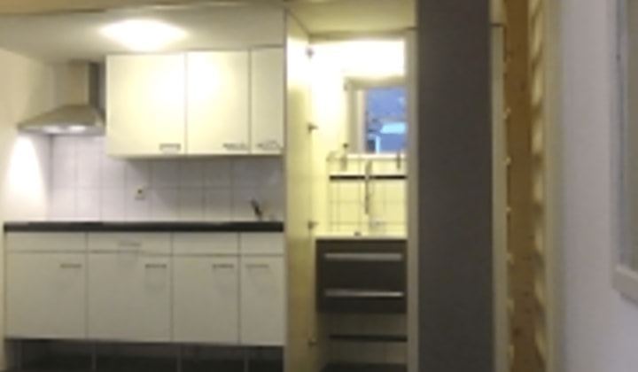 Gestoffeerde studio met wasmachine en all-in prijs