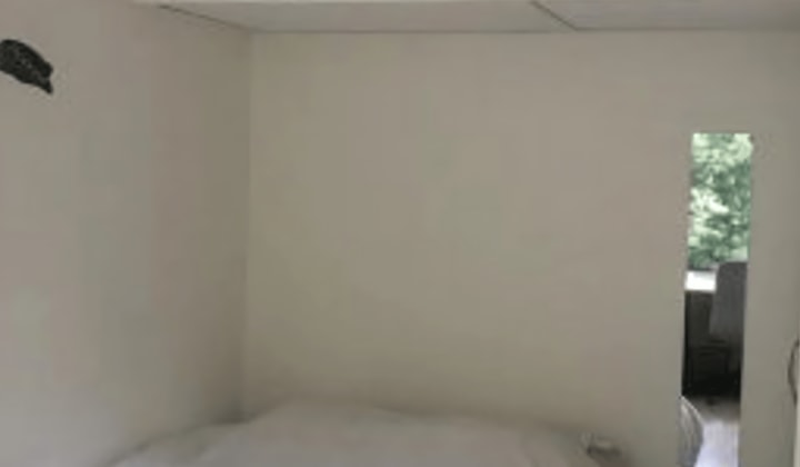 Gestoffeerde kamer met balkon
