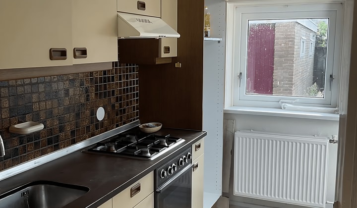 Huis met tuin, balkon en parkeergelegenheid