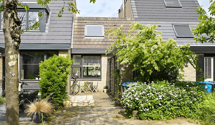 Eengezinswoning met Balkon en Tuin