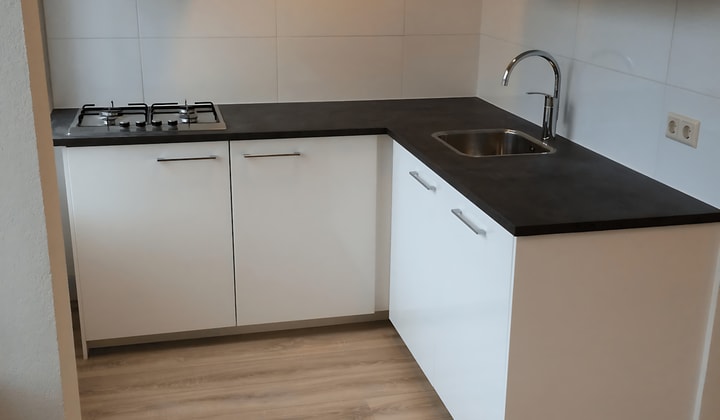 Gestoffeerde studio met inloopdouche en gedeeld toilet
