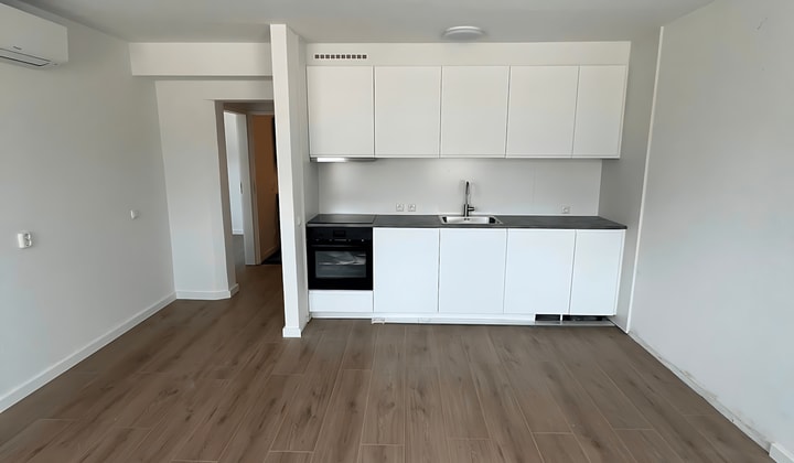 Gestoffeerd appartement met één slaapkamer en inloopdouche