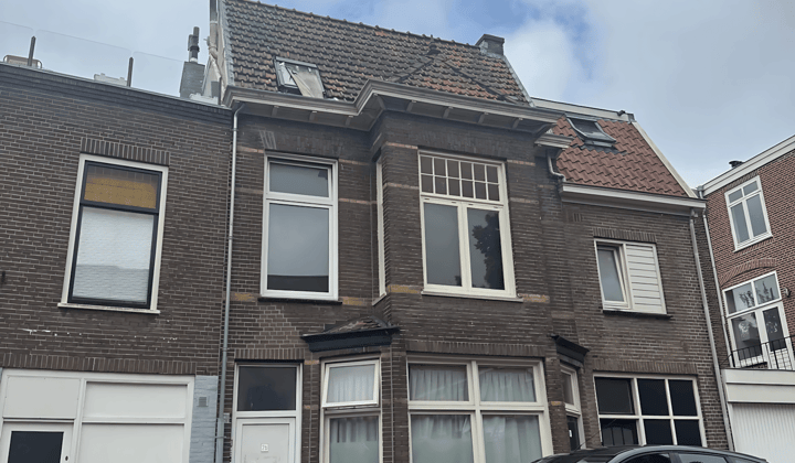 Gestoffeerde kamer met 1 slaapkamer en gedeelde voorzieningen