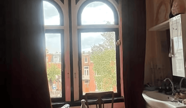 Kleine kamer met gedeelde tuin en wasmachine