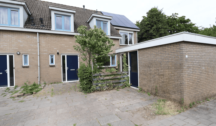 Eengezinswoning met tuin en wasmachineaansluiting