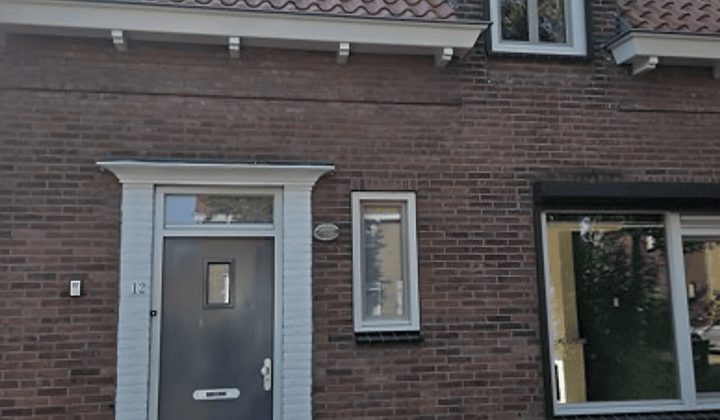 Eengezinswoning met tuin en parkeergelegenheid