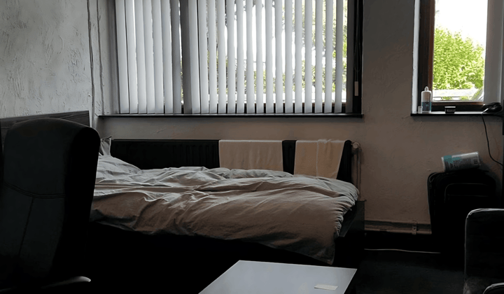 Gestoffeerde studentenkamer met tuin en wifi