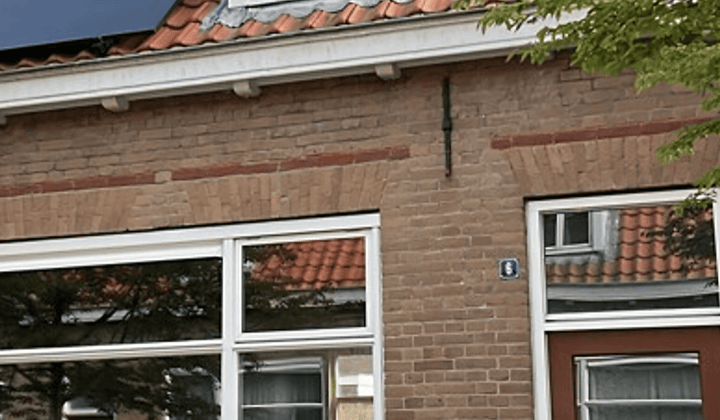 Eengezinswoning met tuin en parkeergelegenheid