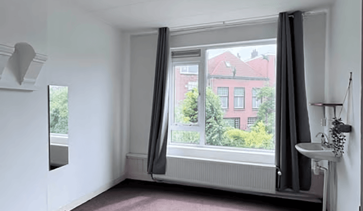 Kamer in gedeeld huis met tuin