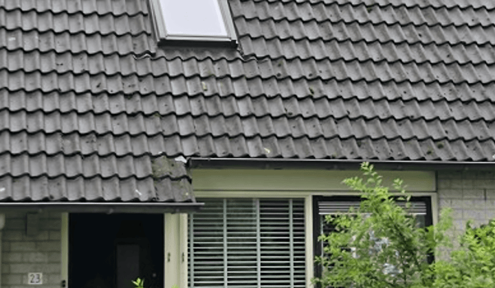 Eengezinswoning met tuin en parkeerplaats