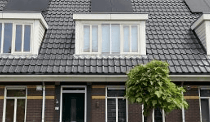 Tussenwoning met tuin en drie slaapkamers