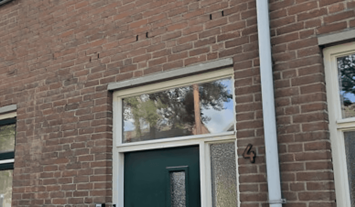 Eengezinswoning met tuin en parkeergelegenheid