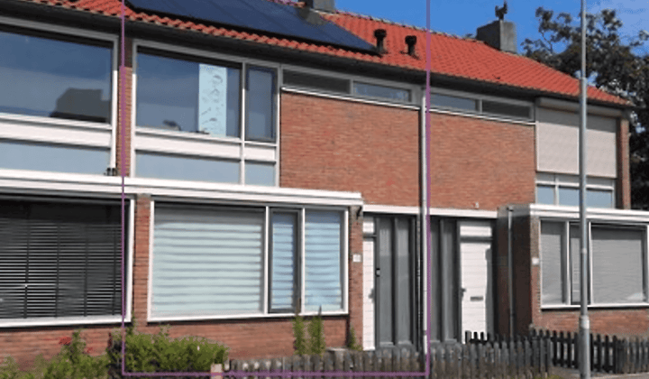 Eengezinswoning met tuin en parkeerplaats