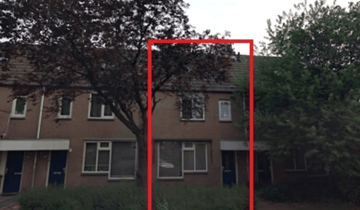 Eengezinswoning met tuin en parkeerplaats