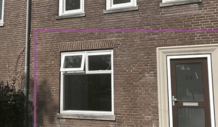 Appartement met tuin en parkeerplaats