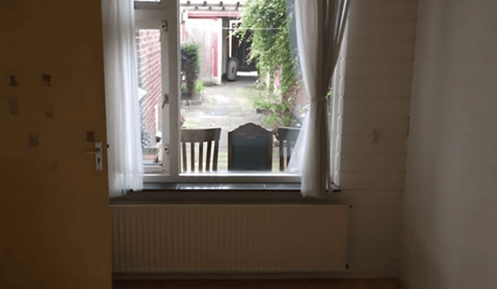 Studentenkamer met tuin en wasmachine