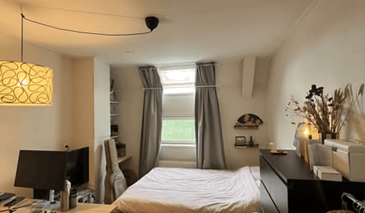 Kamer met tuin in gedeeld huis voor werkende vrouwen